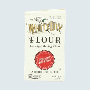 Package showing White Lily flour, labeled 