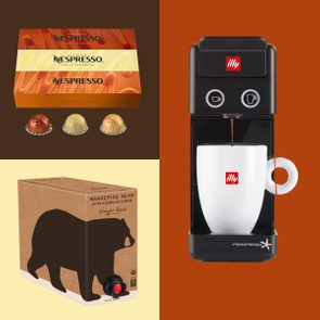 Coffee capsules displayed beside branded boxes; a black coffee machine brews into a white cup; brown and orange background.