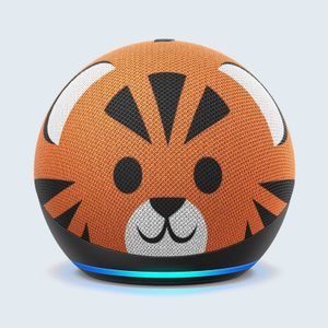 Round smart speaker, displaying a tiger face design, sits on a surface. The speaker's base is glowing with a blue light.