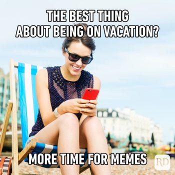 Woman sits smiling on a deck chair, using a phone. Beach background. Text reads, "The best thing about being on vacation? More time for memes."