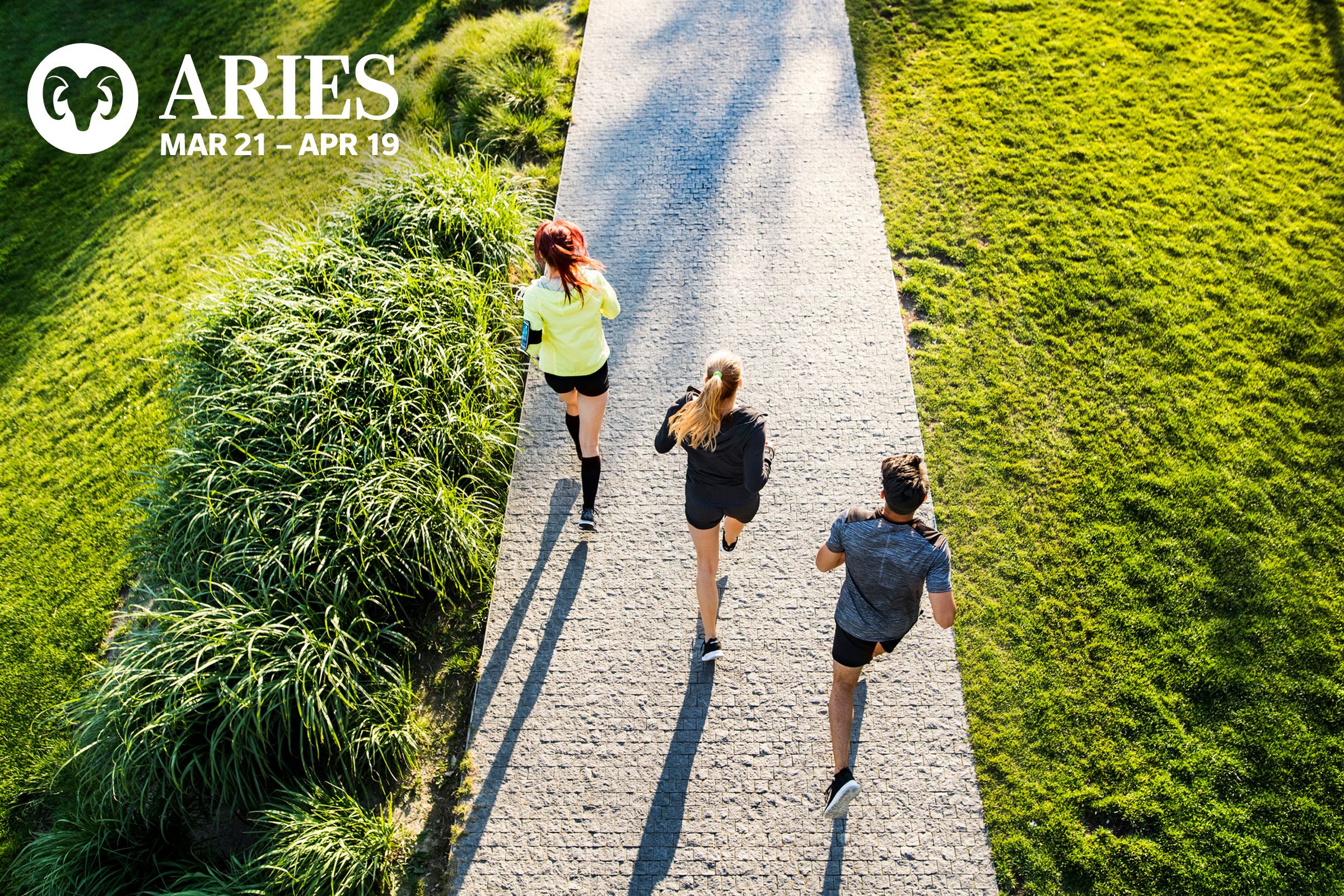 three people running, one in the lead
