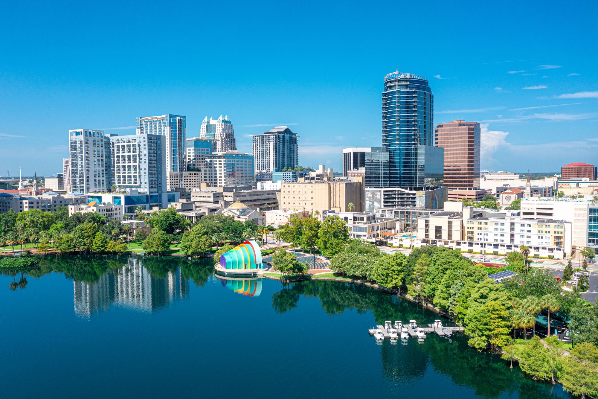 Aerial View Of Orlando Skyline And Reflection In Lake Eola