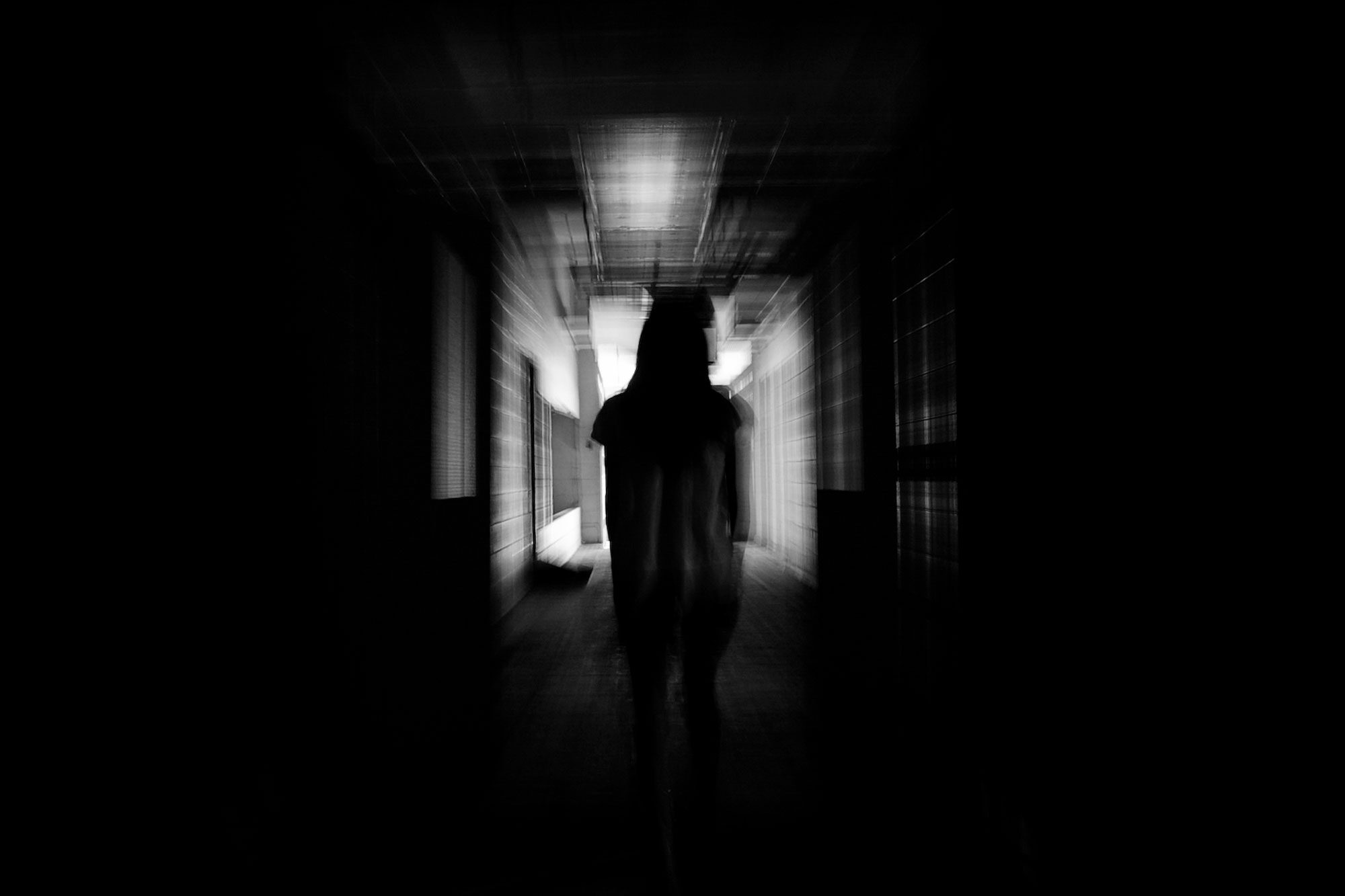 Creepy Hallway With A Women Ghost